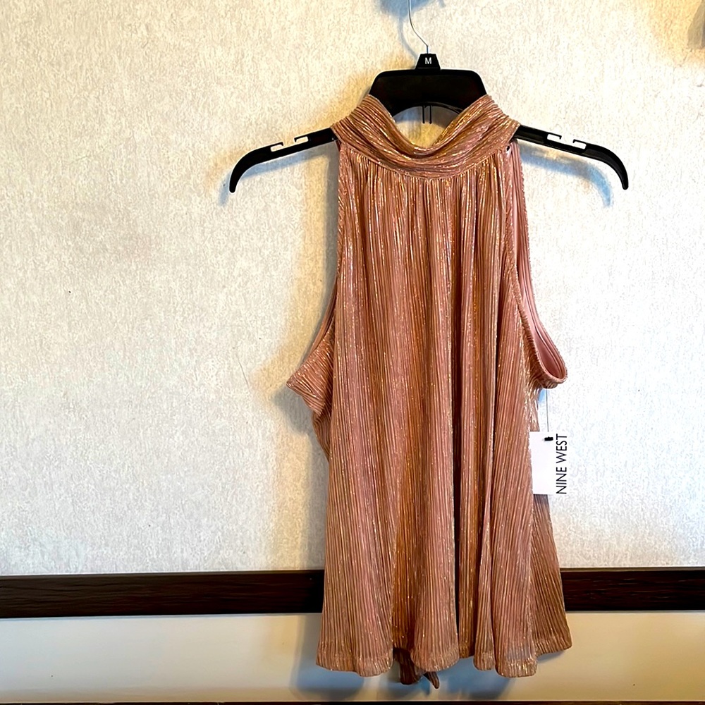 Medium shimmering sleeveless top.